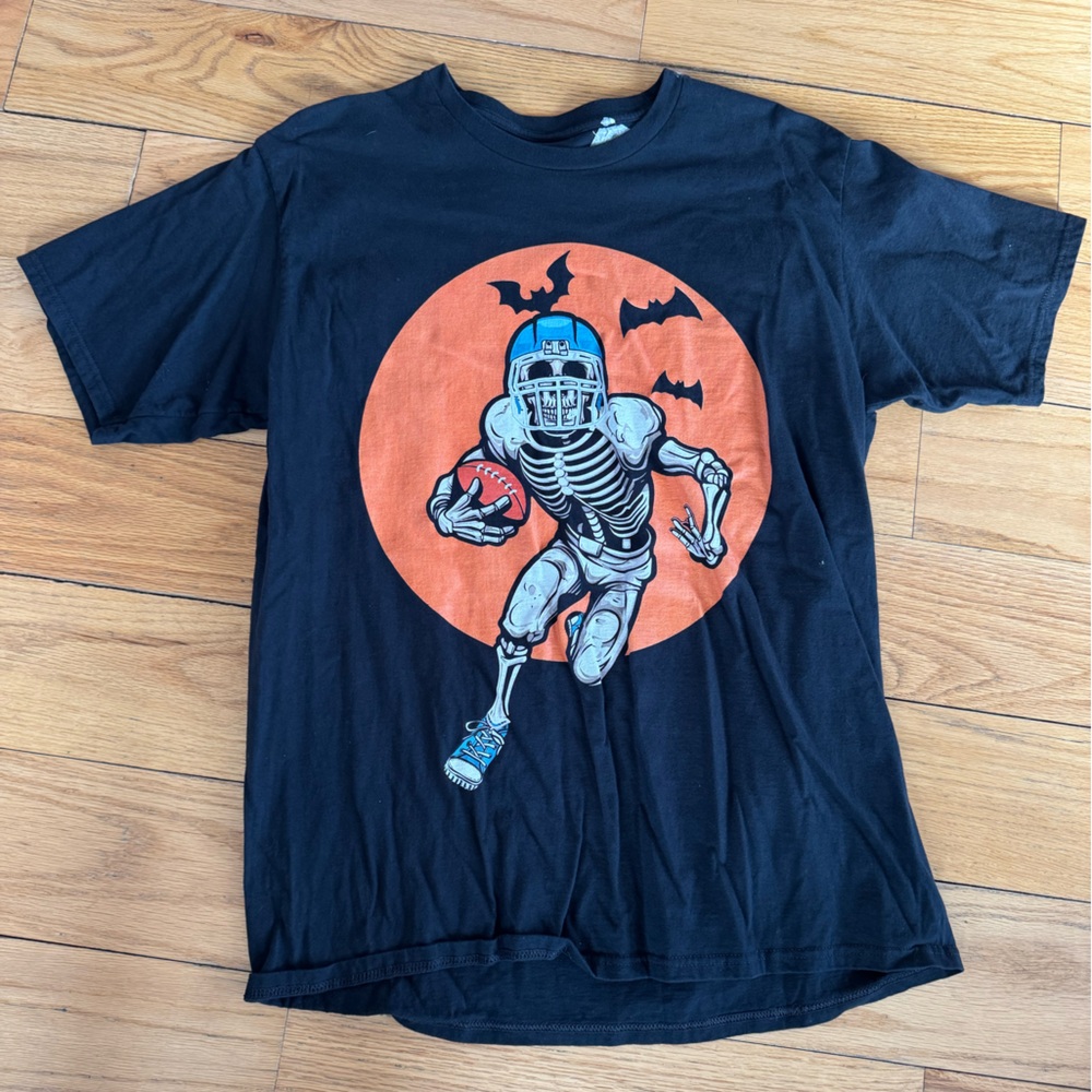 Black T-Shirt with Skeleton and Orange Circle Design
